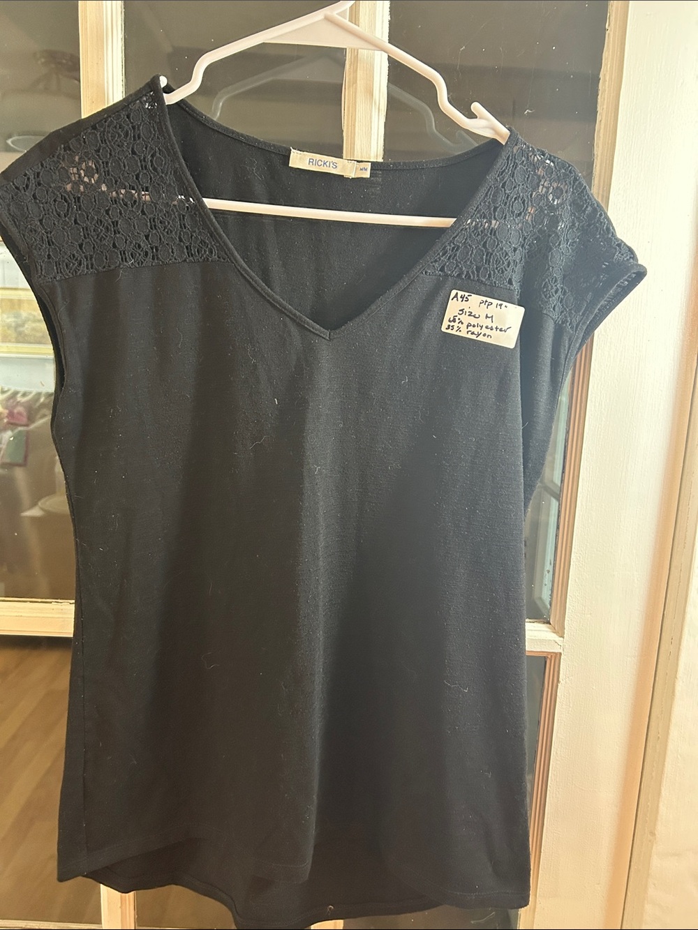 A45.    Ricki's Black V-Neck Lace Cap-Sleeve Camisole